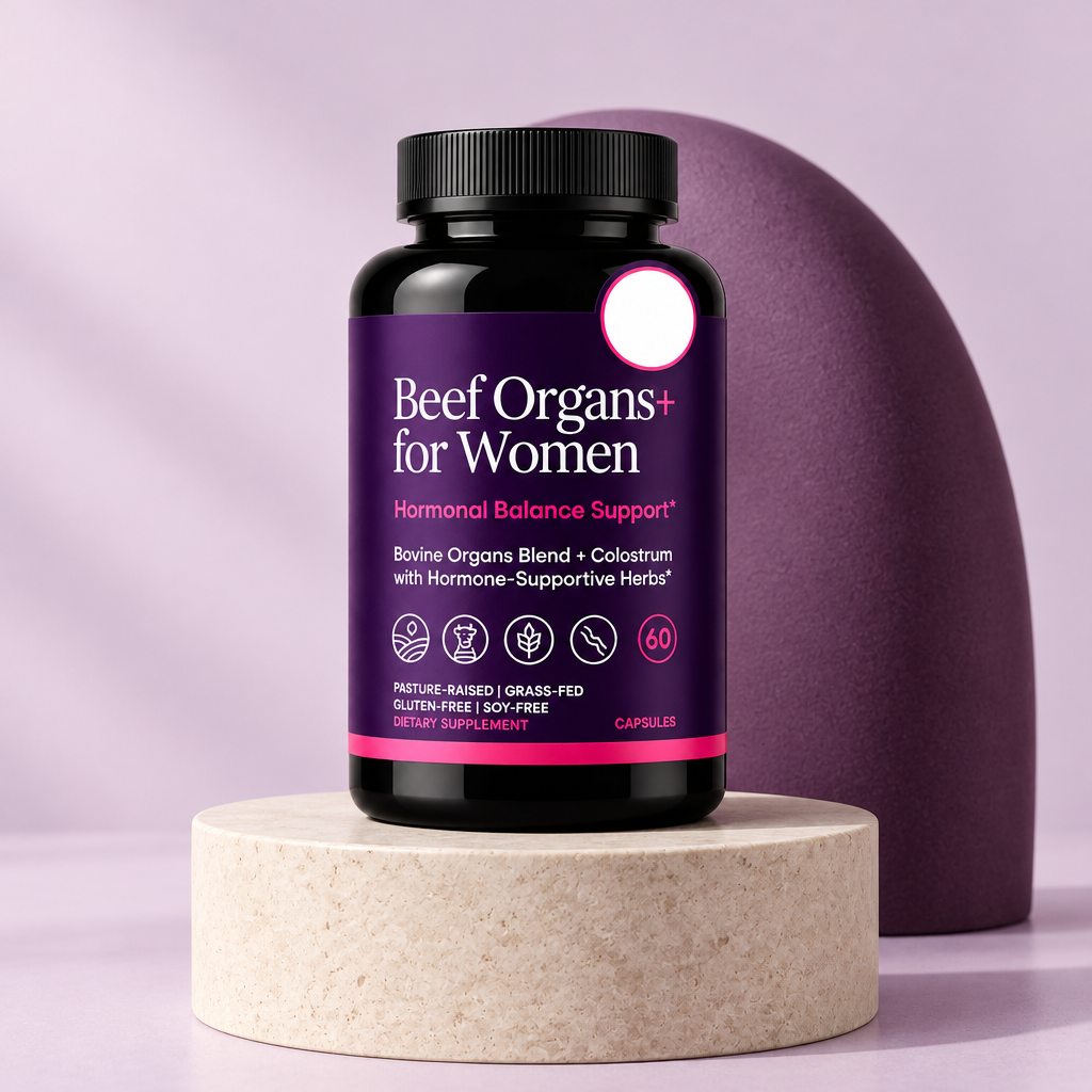 Beef Organs+ for Women bottle on a stone pedestal